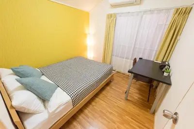 a small bedroom with a bed and a desk at Shinjuku-ku - House / Vacation STAY 6644 in Tokyo