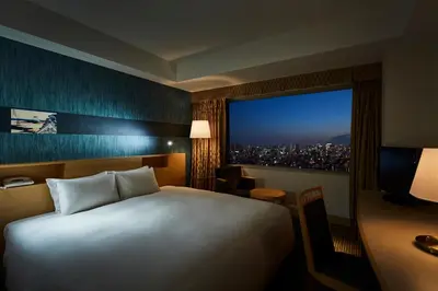 a hotel room with a large bed and a window at Tobu Hotel Levant Tokyo in Tokyo