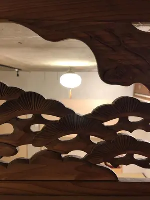 a close up of a wooden ceiling with a light at Shibuya神宮前 DAICHI&SOTEN in Tokyo