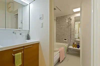 a bathroom with a tub and a sink and a bath tub at CuteFamilyHouse! 3LDK 6minShinjuku 3minJRsta Cozy,Fun,Bright! KidsFree Under6yrs in Tokyo