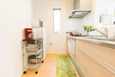 a kitchen with a sink and a refrigerator at CuteFamilyHouse! 3LDK 6minShinjuku 3minJRsta Cozy,Fun,Bright! KidsFree Under6yrs in Tokyo