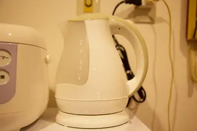 a white mixer sitting on top of a counter at Akasaka Koyu Building 801 in Tokyo