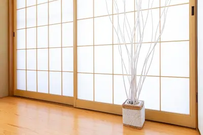 a vase sitting in front of a large window at HARMONIA\u6771\u4eac\u5800\u5207 10\u540d\u5b9a\u54e190\u5e73\u7c73\u306e\u5e83\u3044Condominium in Tokyo