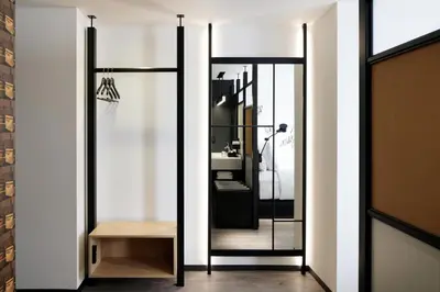 a dressing room with a mirror and a table at Aloft Tokyo Ginza in Tokyo