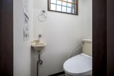 a bathroom with a toilet and a sink at 3-40-8 / Vacation STAY 77973 in Tokyo