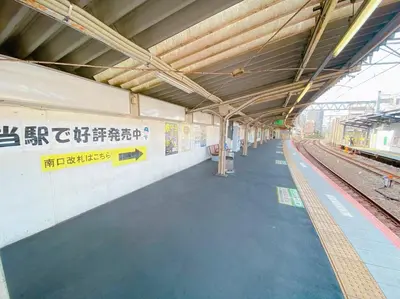 an empty train station with a train on the tracks at 3-40-8 / Vacation STAY 77971 in Tokyo