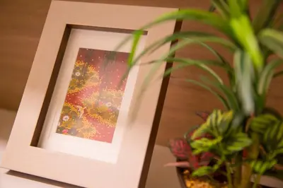 a picture frame sitting next to a potted plant at Oshiage Sky View Terrace Penthouse - brand new Hot Tab installed in 2025- in Tokyo
