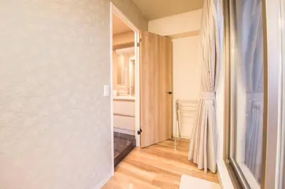 a room with a hallway with a door to a closet at Oshiage Sky View Terrace Penthouse - brand new Hot Tab installed in 2025- in Tokyo