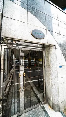 an entrance to a building with a sign on it at CASA VERDE Shinjuku# 1K in Tokyo