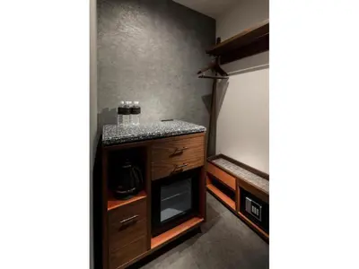 a small kitchen with a counter and a stove at THE LIVELY AZABUJUBAN TOKYO / Vacation STAY 77707 in Tokyo