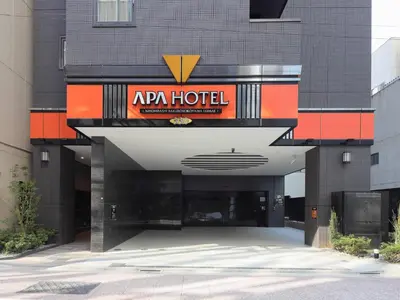 a building with an rvr hotel sign on it at APA Hotel Nihombashi Bakuroyokoyama Ekimae in Tokyo