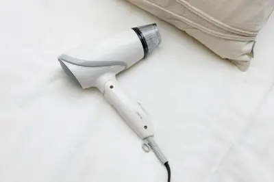 a blow dryer sitting on top of a table at Maison d'Orme 503 in Tokyo