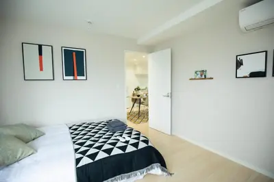 a bedroom with a bed and a desk in a room at \u5bc5\u30db\u30c6\u30eb \u53f0\u6771 Hotel \u5bc5 \u53f0\u4e1c Tora Hotel Taito C in Tokyo