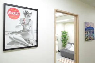 a framed picture of a woman on a wall at \u5bc5\u30db\u30c6\u30eb \u53f0\u6771 Hotel \u5bc5 \u53f0\u4e1c Tora Hotel Taito A in Tokyo
