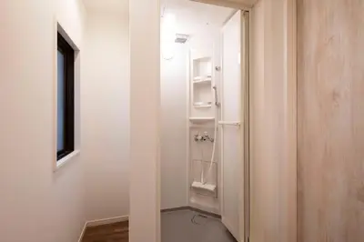 a hallway with a door leading into a room at HOTEL LITTLE BIRD OKU-ASAKUSA / Vacation STAY 79431 in Tokyo
