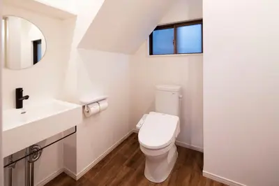 a white bathroom with a toilet and a sink at HOTEL LITTLE BIRD OKU-ASAKUSA / Vacation STAY 79431 in Tokyo