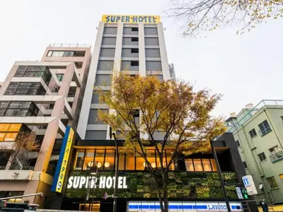 a building with a sign on top of it at Super Hotel Tokyo Kinshicho Ekimae / Vacation STAY 79359 in Tokyo