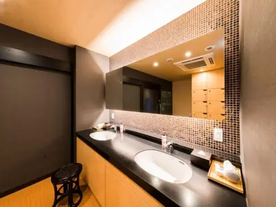 a bathroom with two sinks and a large mirror at Super Hotel Tokyo Kinshicho Ekimae / Vacation STAY 79359 in Tokyo