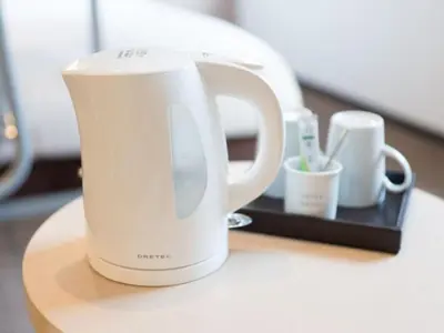 a white coffee pot sitting on a table at Super Hotel Tokyo Kinshicho Ekimae / Vacation STAY 79354 in Tokyo