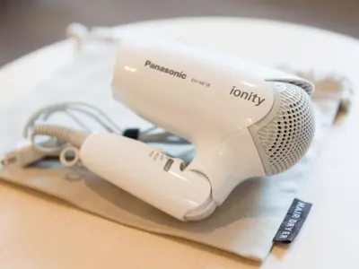 a hair dryer sitting on top of a table at Super Hotel Tokyo Kinshicho Ekimae / Vacation STAY 79346 in Tokyo