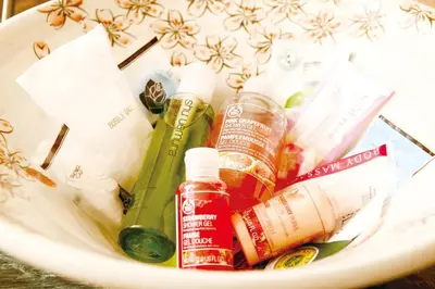 a white bowl filled with different types of liquids at Hotel Lotus Koiwa (Adult Only) in Tokyo