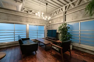 a room with a table and chairs and windows at prosperityta Yutaka 2F / Vacation STAY 80031 in Tokyo