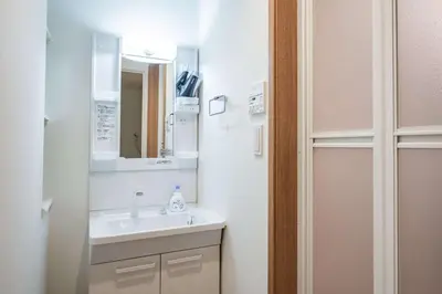 a bathroom with a sink and a mirror at Noah Ikebukuro / Vacation STAY 7295 in Tokyo