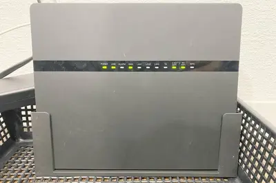 a laptop computer sitting on top of a crate at SunStay - Tachiaigawa 1 in Tokyo