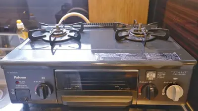 a toaster oven with two burners on top of it at TOKYO ICHIBAN ASAKUSA in Tokyo