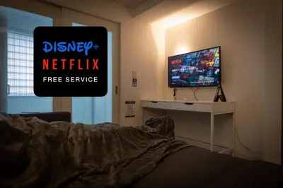 a television in a bedroom with a bed and a tv screen at Home Sweet Office Heiwajima in Tokyo