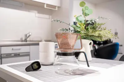 a blender sitting on top of a kitchen counter at Home Sweet Office Heiwajima in Tokyo