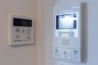 a machine is attached to a wall at Home Sweet Office Heiwajima in Tokyo