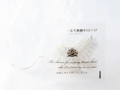 a sign for the chinese consulate with a trophy at APA Hotel Roppongi SIX in Tokyo