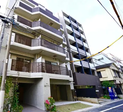 a building with balconies on the side of a street at Jeffery Skytree Residence Tokyo in Tokyo