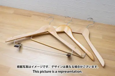 a couple of wooden hangers on a wooden floor at Elm\u9ad8\u7530\u99ac\u5834 in Tokyo