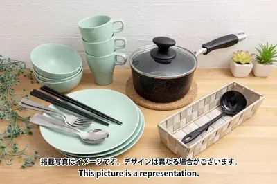 a table with a plate and a pot and utensils at Elm\u9ad8\u7530\u99ac\u5834 in Tokyo
