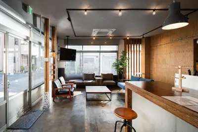a living room with a couch and a table at Mochida Hall 1F / Vacation STAY 80337 in Tokyo