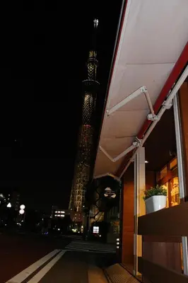 a view of the eiffel tower at night at Sumida-ku - House / Vacation STAY 80877 in Tokyo