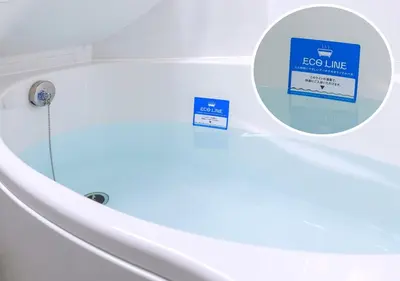 a bathroom with a toilet with a sign on it at APA Hotel Higashi Shinjuku Kabukicho Tower in Tokyo