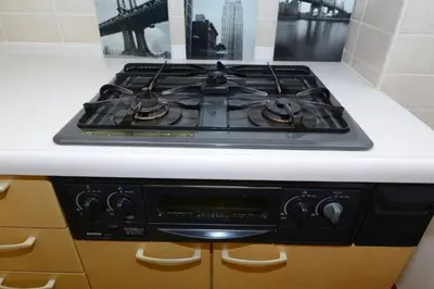 a stove top oven sitting on top of a kitchen counter at Sumida-ku - House / Vacation STAY 80342 in Tokyo