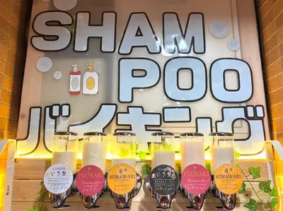 a display of wine glasses in front of a showroom at Tabist Hotel Aurora Ikebukuro in Tokyo
