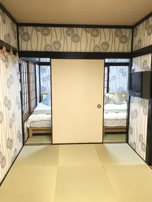 a room with a door in the middle of a room at My Home in Tokyo in Tokyo