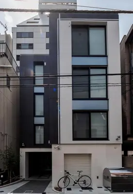 a bike parked in front of a building at Space F Yoyogi in Tokyo