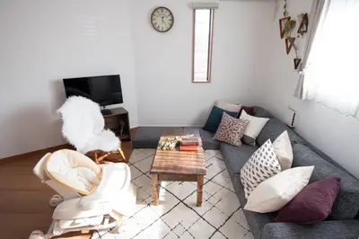 a living room with a couch and a table at Sumida-ku - House - Vacation STAY 82129 in Tokyo