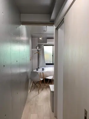 a room with a table and a dining room at Itos Ebisu in Tokyo