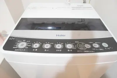 a microwave oven sitting on top of a counter at Hill Side Terrace Hiroo Shibuya 202 in Tokyo