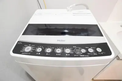 a hello microwave oven sitting on top of a counter at Hill Side Terrace Hiroo Shibuya 103 in Tokyo