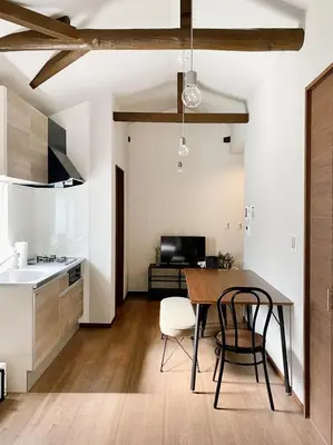 a kitchen and dining room with a table and chairs at Villa Belle-Vue Kanegafuchi in Tokyo