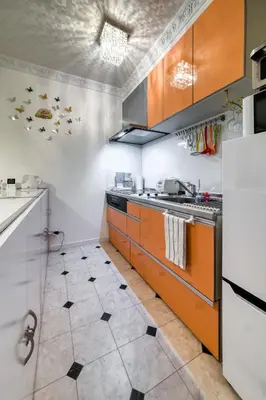 a kitchen with a sink and a stove at Diamond Moon Palace Takadanobaba,2 stops to Shinjuku in Tokyo