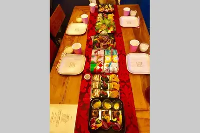 a table with many different types of food on it at Indigo flat in Asakusa in Tokyo